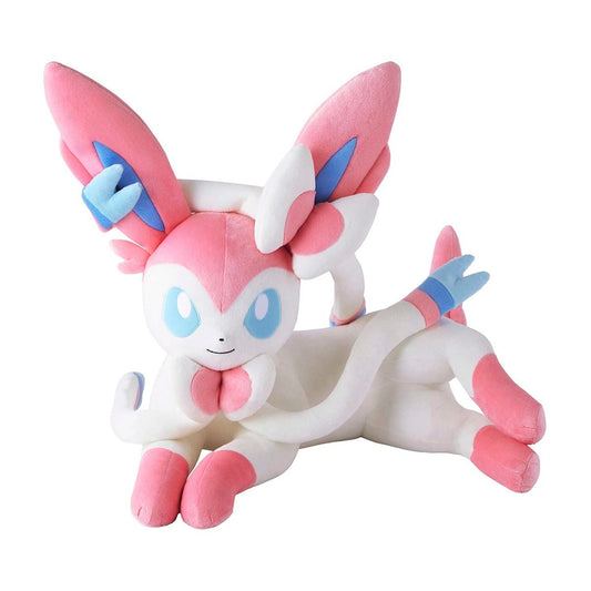 Plush toy of a pink and white creature with large ears on a white background