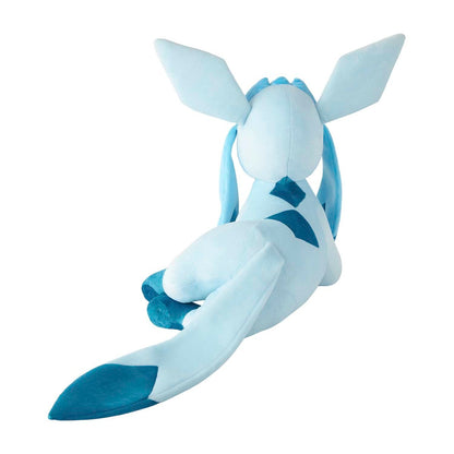 A light blue and dark blue plush toy of a feline-like Pokémon character, photographed on a clean white background.