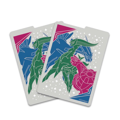 Three playing cards with colorful dragon designs on a white background