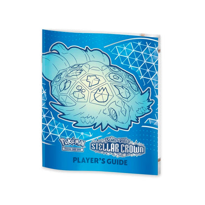 Pokémon Stellar Crown Player's Guide with a blue cover featuring a celestial design.