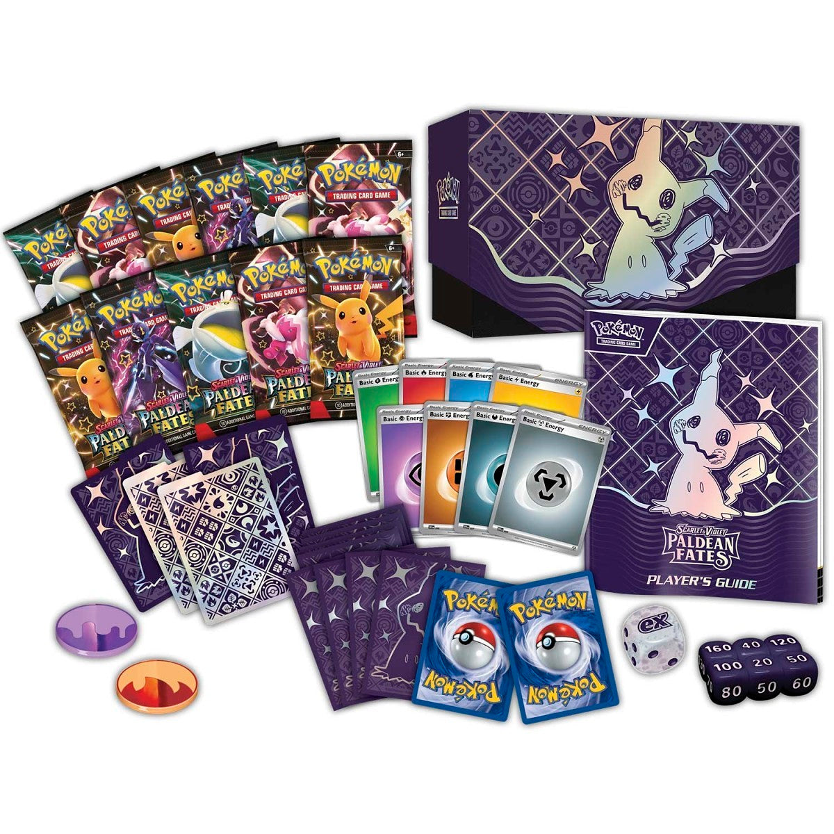 Pokémon trading card game set with cards, guidebook, and dice on a white background