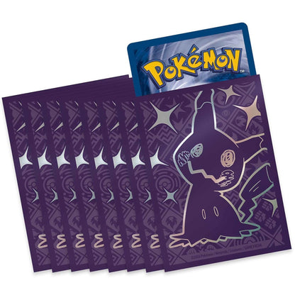Pokémon trading card packs with a purple card featuring a ghost-like creature design.